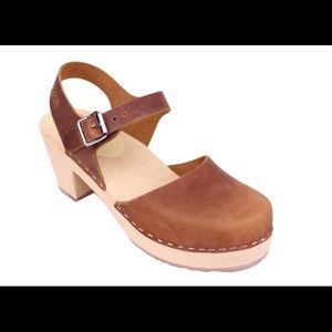 Brand new, low heel, closed toe clogs